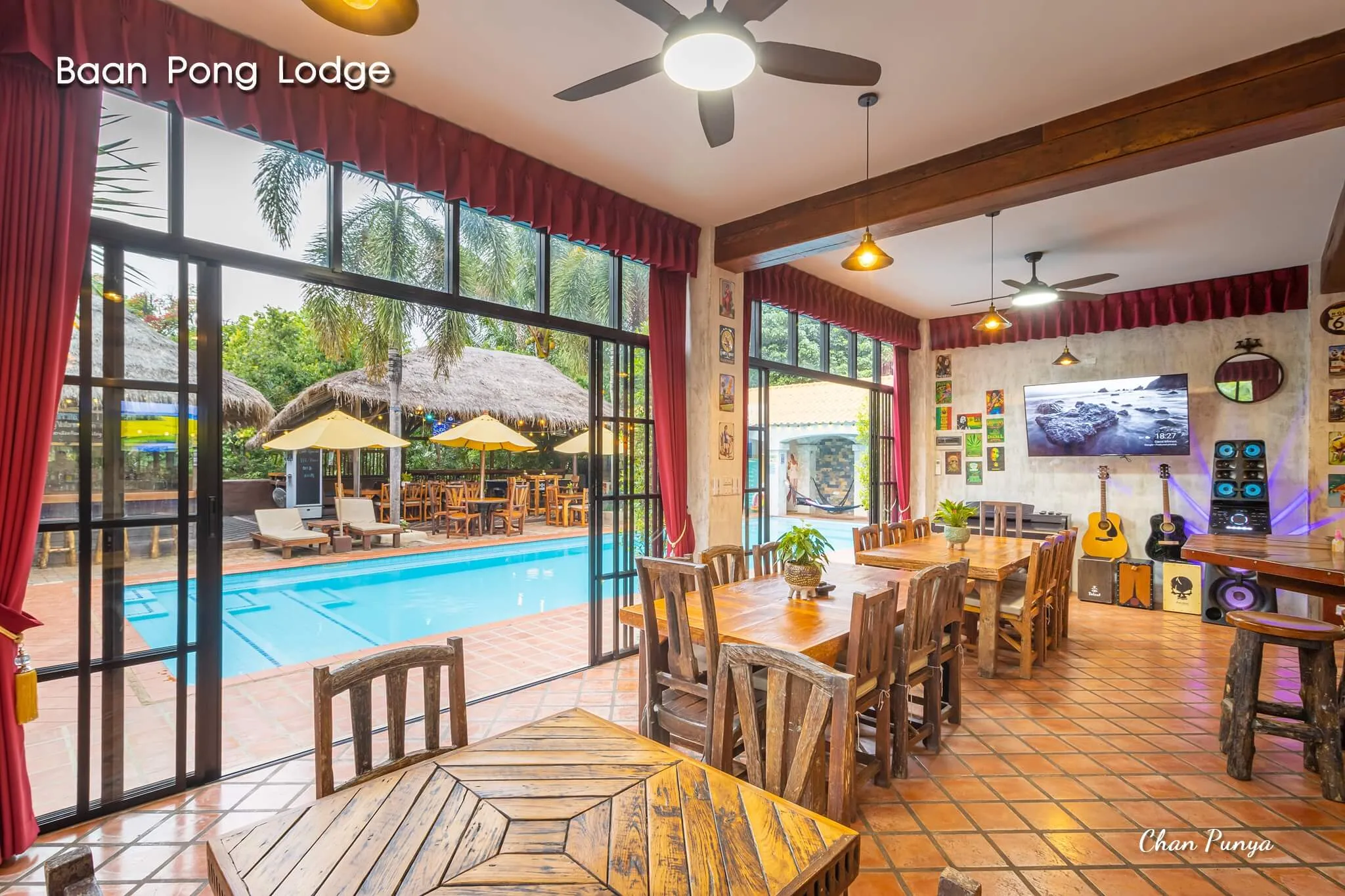 The restaurant looking through its windows to the pool