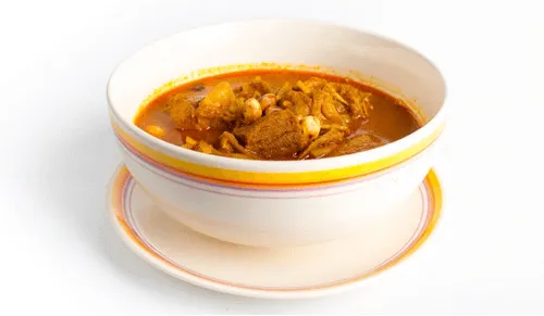 Gang hangleh, the northern Thai slow-cooked pork curry, in a bowl