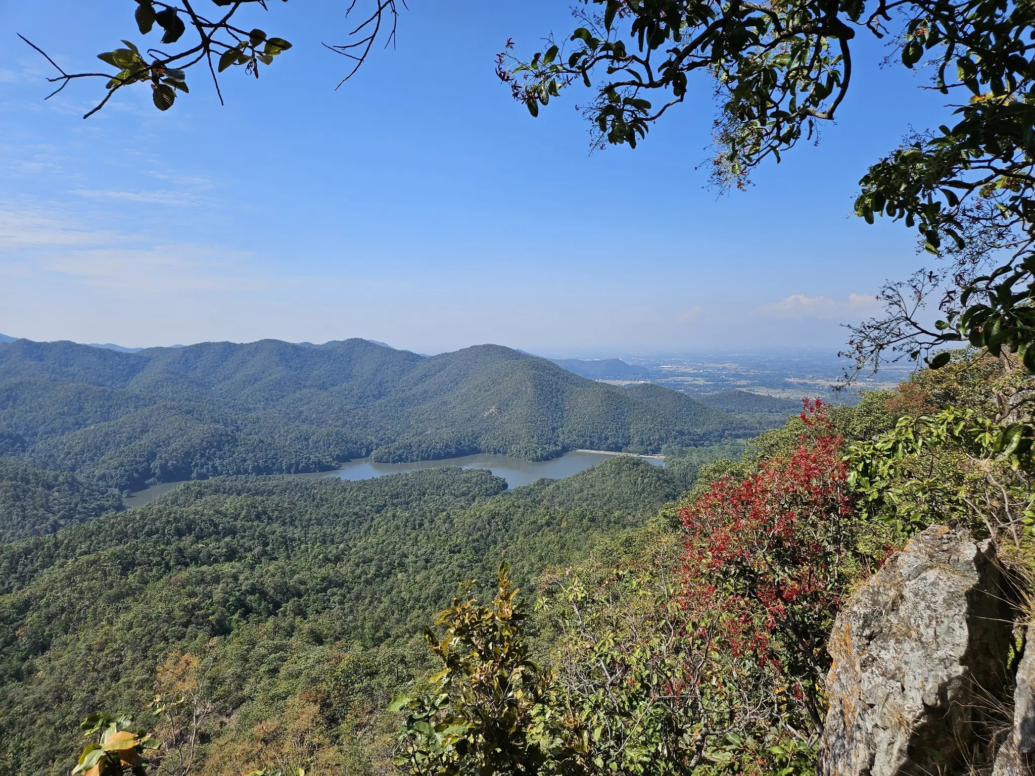 The view from the ridge at Mon Jing, forested hills running down to the plain