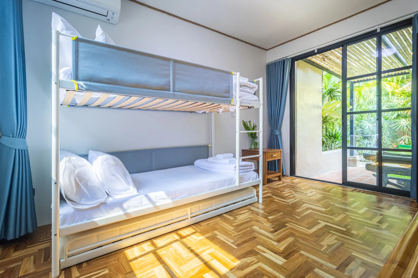 Bunk beds in the adjoining room, with doors onto the terrace