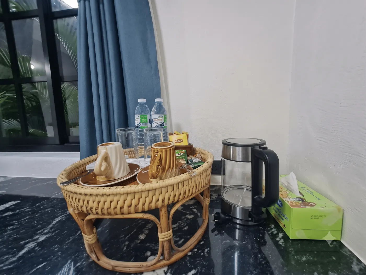 The tea tray and kettle on the marble top
